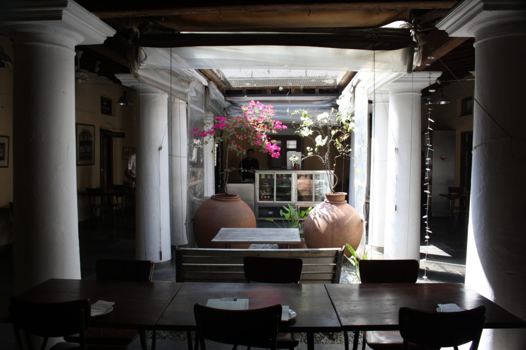 These pillars that show British era architecture of cinnamon cafe.

This building is one of the living examples of heritage and culture of Bangalore's past